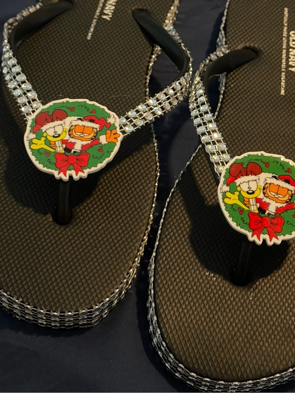 Black Rhinestone Flip Flops with Festive Cartoon Charm